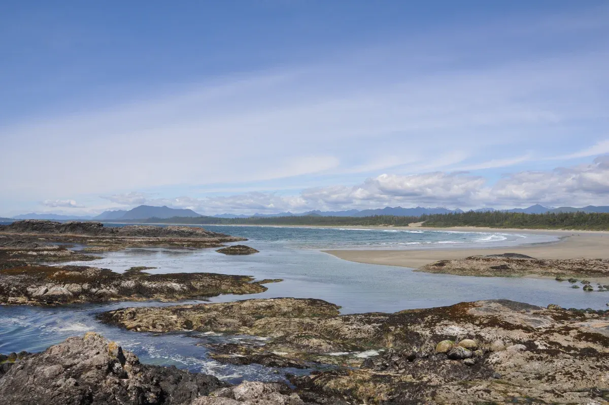 Tidal pools and the long sand of Long Beach in Pacific Rim National Park near Tofino, British Columbia