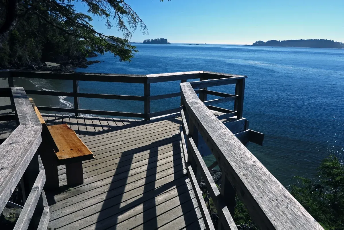 A wooden viewing platform overlooking the water along the Tonquin Trail near Tonquin Beach, Tofino