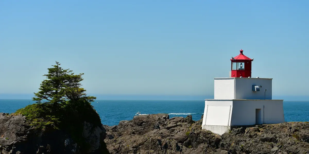 Amphitrite Point Lighthouse on the rocky headland of the Wild Pacific Trail near Ucluelet, close to Tofino